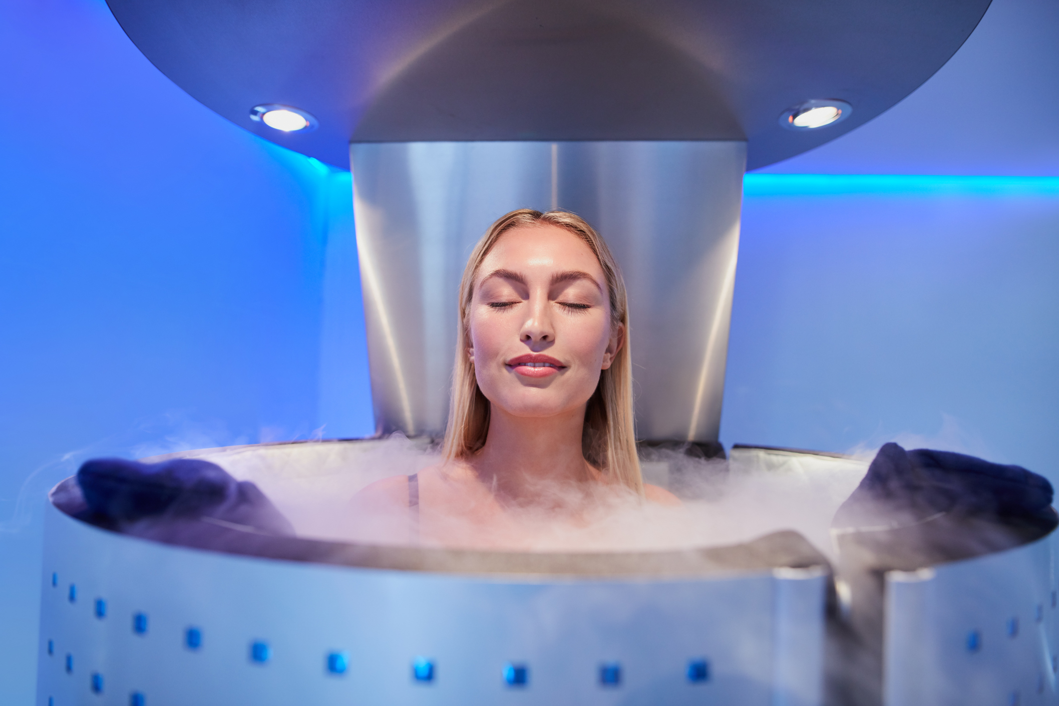 a girl closes her eyes in a steamed bath tub
